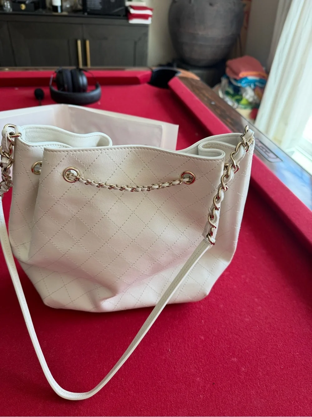 CHANEL Cream Quilted Drawstring Bucket Bag with Gold Chain